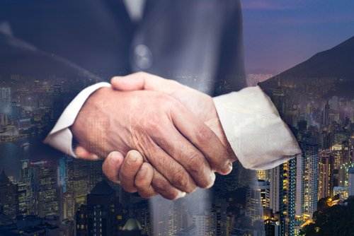 national leaders shaking hands for congratulation in success of trading business deal contract between the country