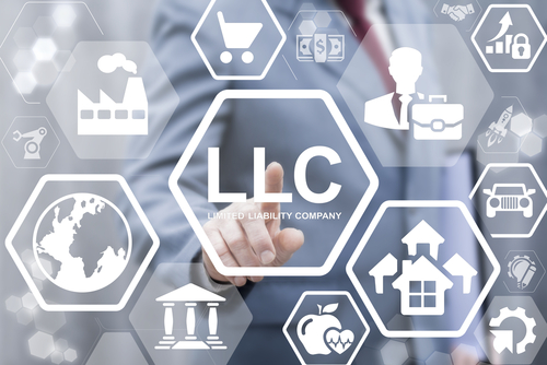 businessman touched LLC word icon on virtual screen